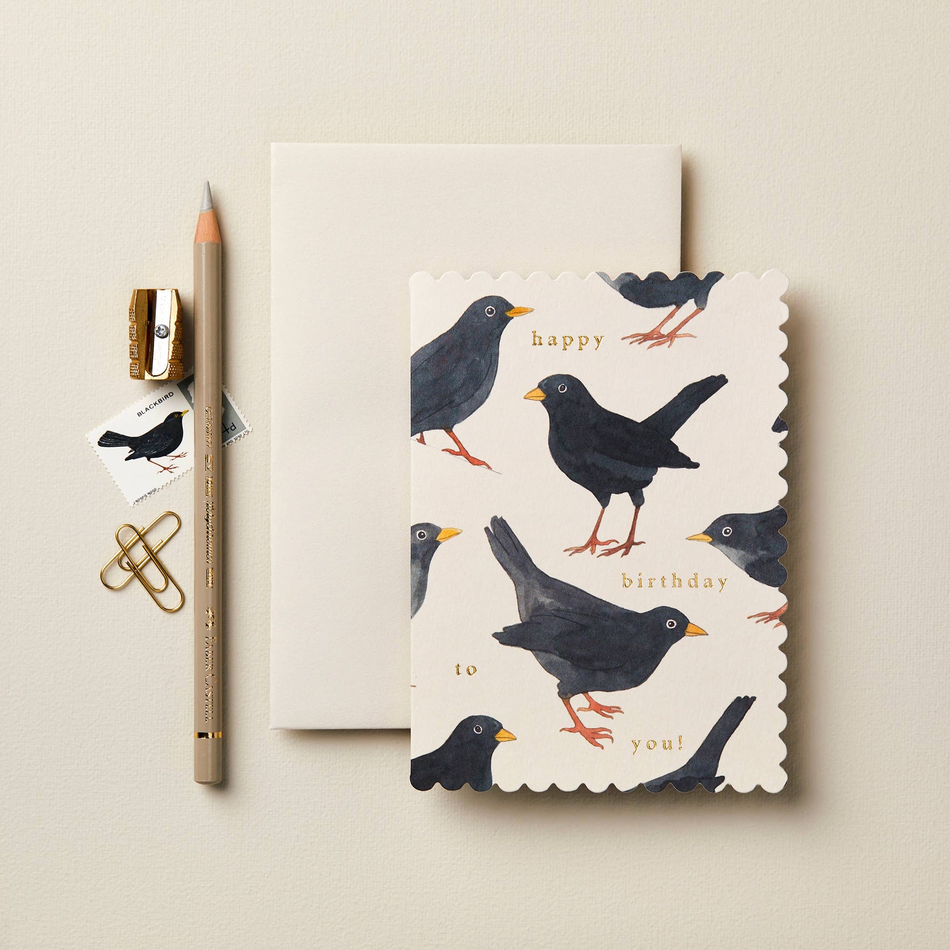 Blackbird Happy Birthday card paired with its matching envelope