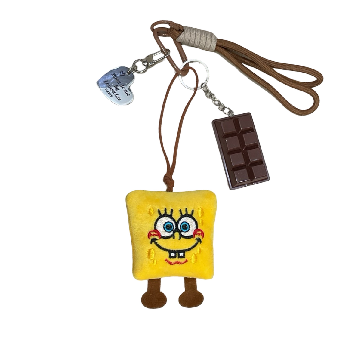 Plush yellow SpongeBob bag charm with a mini chocolate bar charm and small heart tag on a brown cord