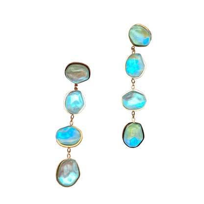 Opal earrings on white background