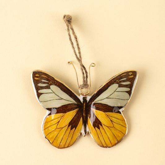 Keepsake Iron Ornament with amber and black butterfly print on a white background - PABOOM