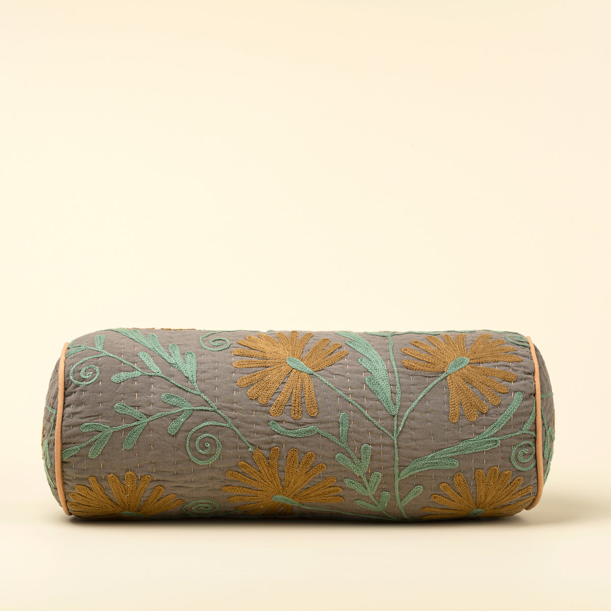 Suzani Embroidered Kantha Bolster in charcoal with terracotta embroidery on a white background - PABOOM