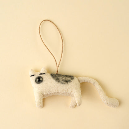 Curious Cat Felt Ornament in cream felt on a white background - PABOOM