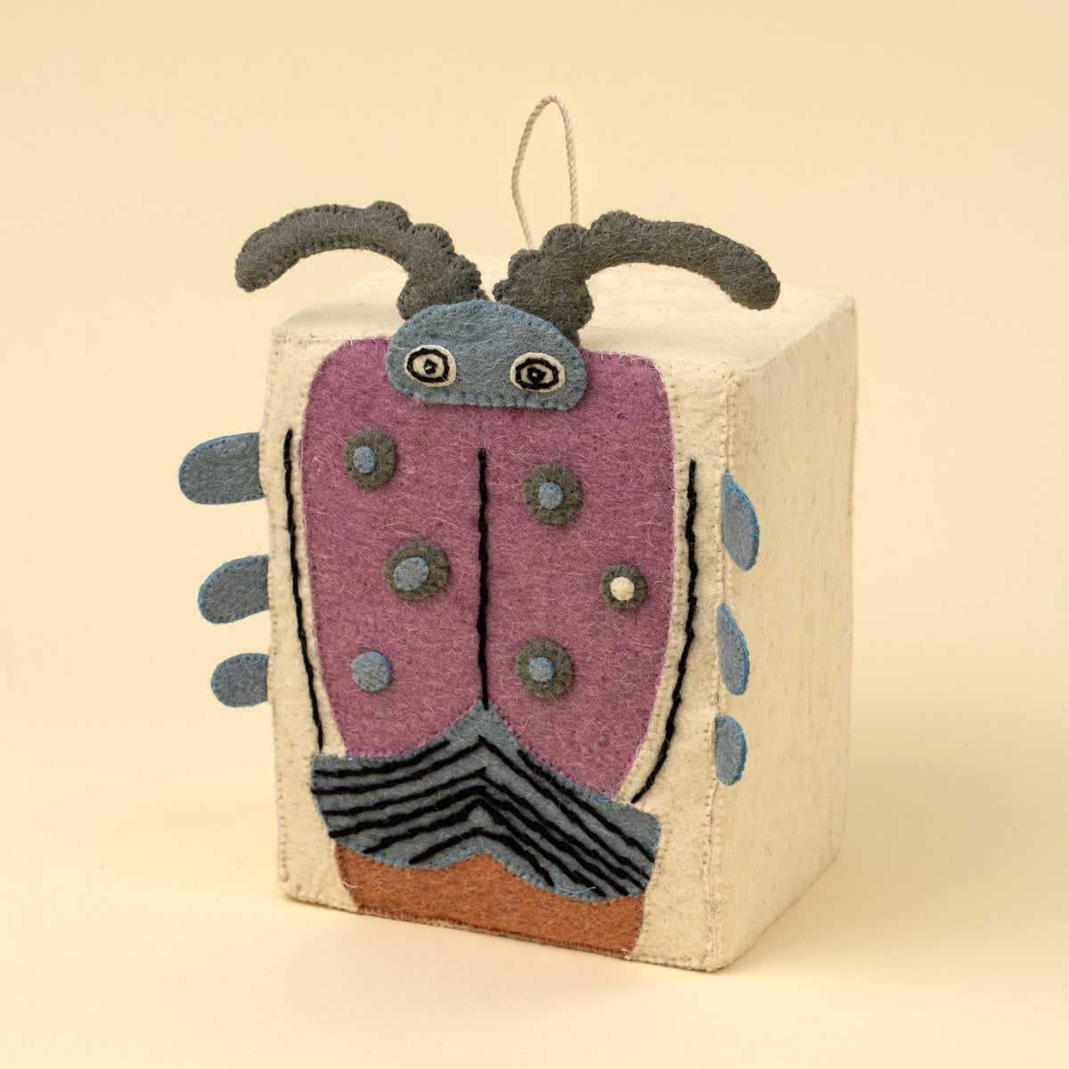 Funky Beetle Felt Doorstop with googly eyes on a white background - PABOOM