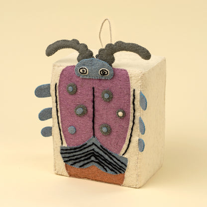 Funky Beetle Felt Doorstop with googly eyes on a white background - PABOOM