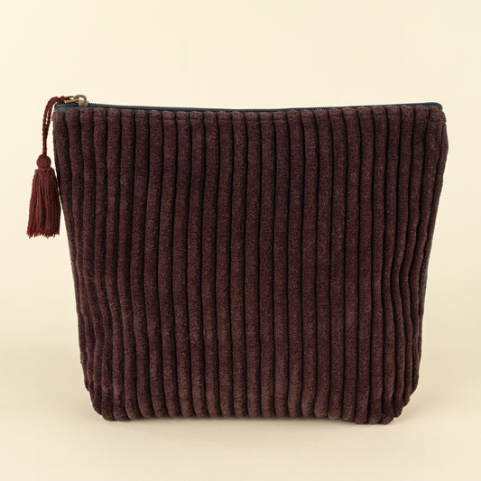 Two-tone sangria and navy corduroy velvet vanity pouch with a tassel zipper pull