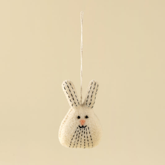 White felt bunny ornament with hand-stitched ears and a sweet embroidered face