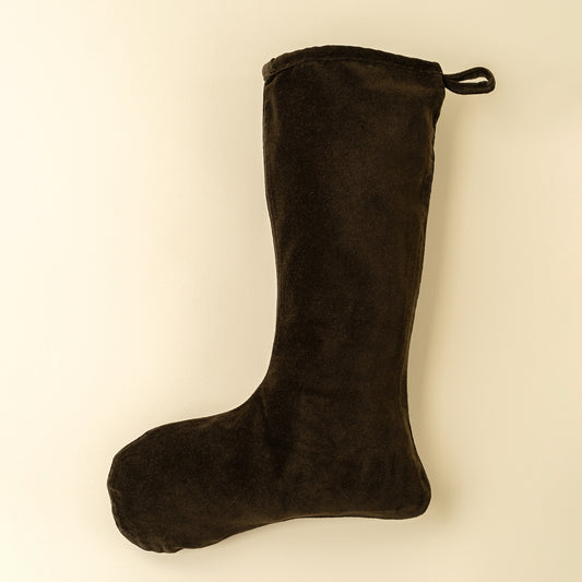 Deep, richly toned velvet Christmas stocking in a dark green hue