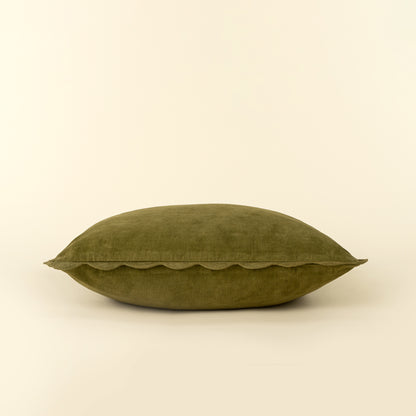 Corduroy Scallop Pillow in Moss styled on a sofa