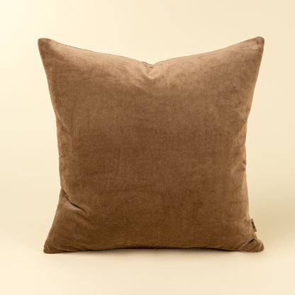 Solid caramel-brown velvet pillow with a soft stonewashed finish