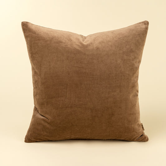 Solid caramel-brown velvet pillow with a soft stonewashed finish