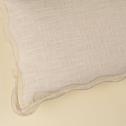 Close-up of the scalloped velvet border on the Velvet Scallop Pillow in Ivory