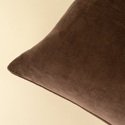 Close-up of the stonewashed velvet texture on the Vera Luxe Velvet Pillow in Clove