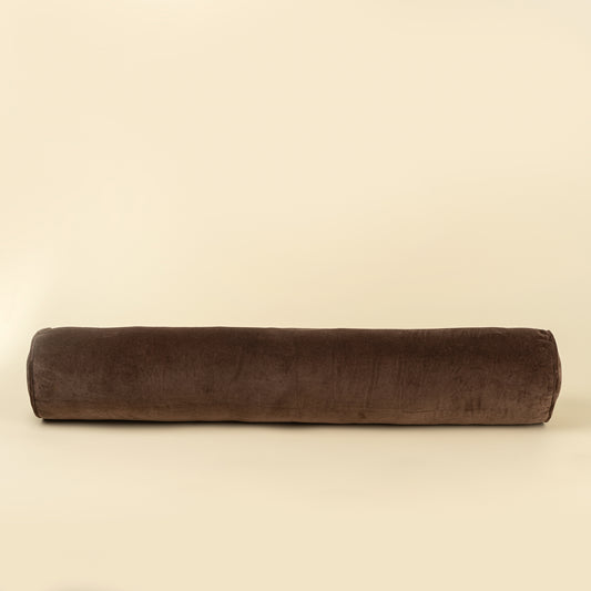 Long cylindrical brown velvet bolster pillow