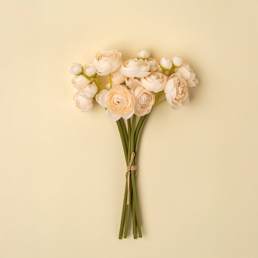 Bundle of cream and blush faux ranunculus flowers tied with raffia