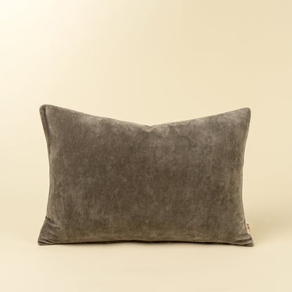 Solid taupe-green velvet lumbar pillow with a soft stonewashed finish
