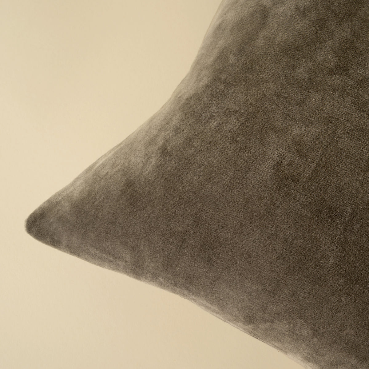 Close-up of the stonewashed velvet texture on the Vera Luxe Velvet Pillow in Cypress