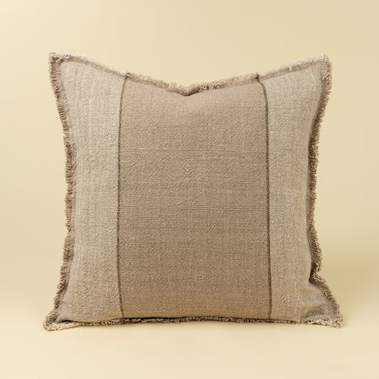 Square sand-toned linen-cotton pillow with a subtly frayed edge
