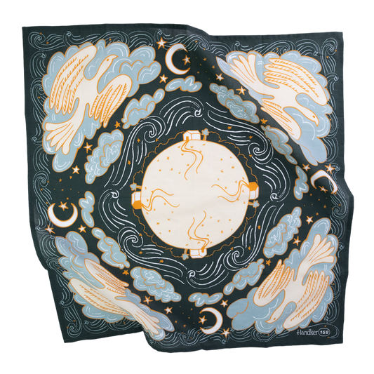 Luna Bandana flat lay in dark teal, blue, cream and orange