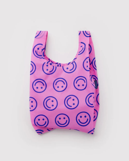 BAGGU Baby Baggu reusable bag in Pop Pink Happy print folded flat - PABOOM
