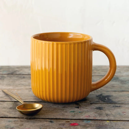 Fluted Mug Saffron shown from above to display the ribbed rim – PABOOM