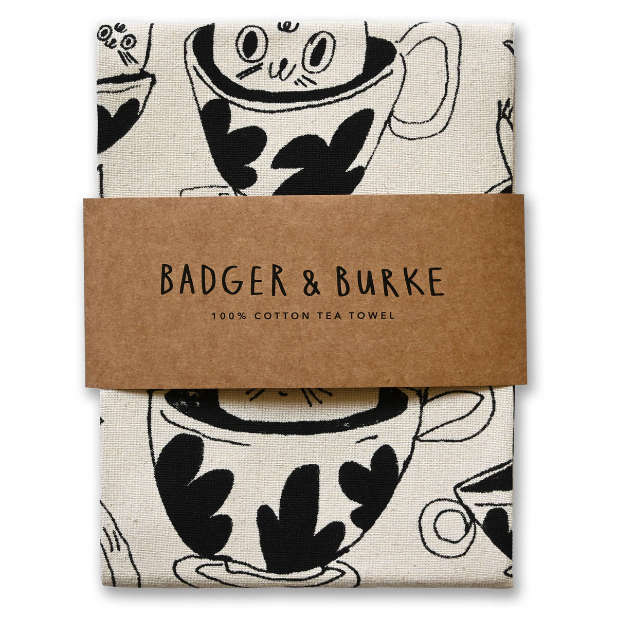Folded natural cotton tea towel printed with black teacups and a cat peeking out, Badger + Burke kraft band - PABOOM