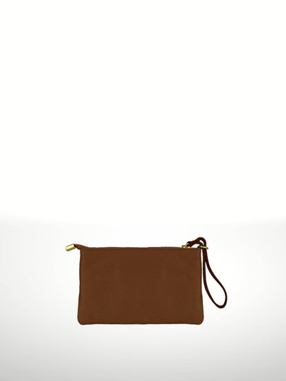Irene Cowhide Bag in Brown — flat leather clutch with zip top and detachable wristlet strap, shown on white background