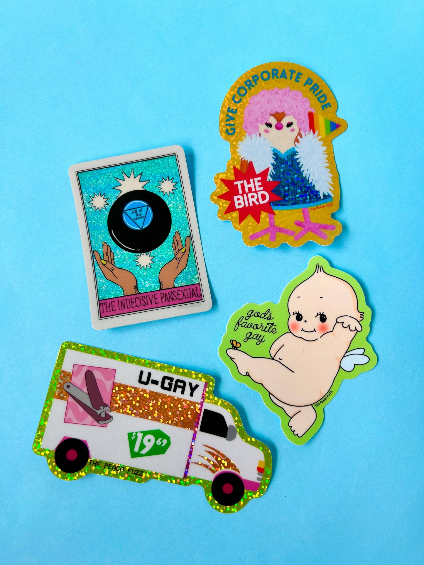 God's Favorite Gay sticker styled with other The Peach Fuzz products