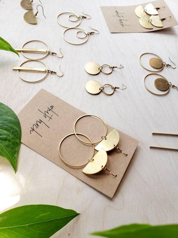 Brass double circle earrings shown for scale