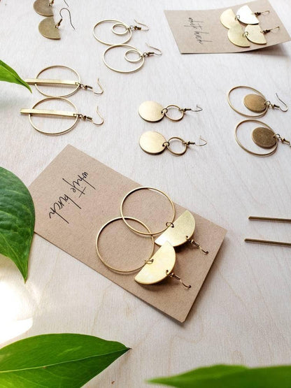 Brass double circle earrings shown for scale