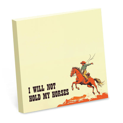 Cream sticky note pad with an illustrated cowboy riding a galloping horse, reading I will not hold my horses
