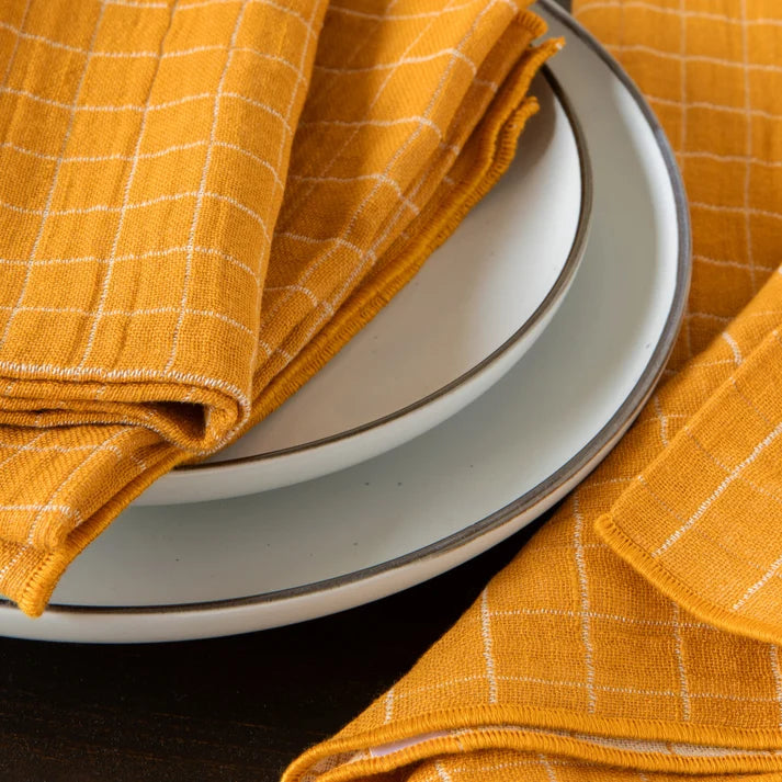 Ochre Double Weave napkins styled on a place setting – PABOOM