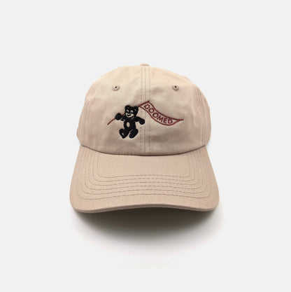 Tan dad hat embroidered with a bear mascot holding a banner reading Doomed - PABOOM
