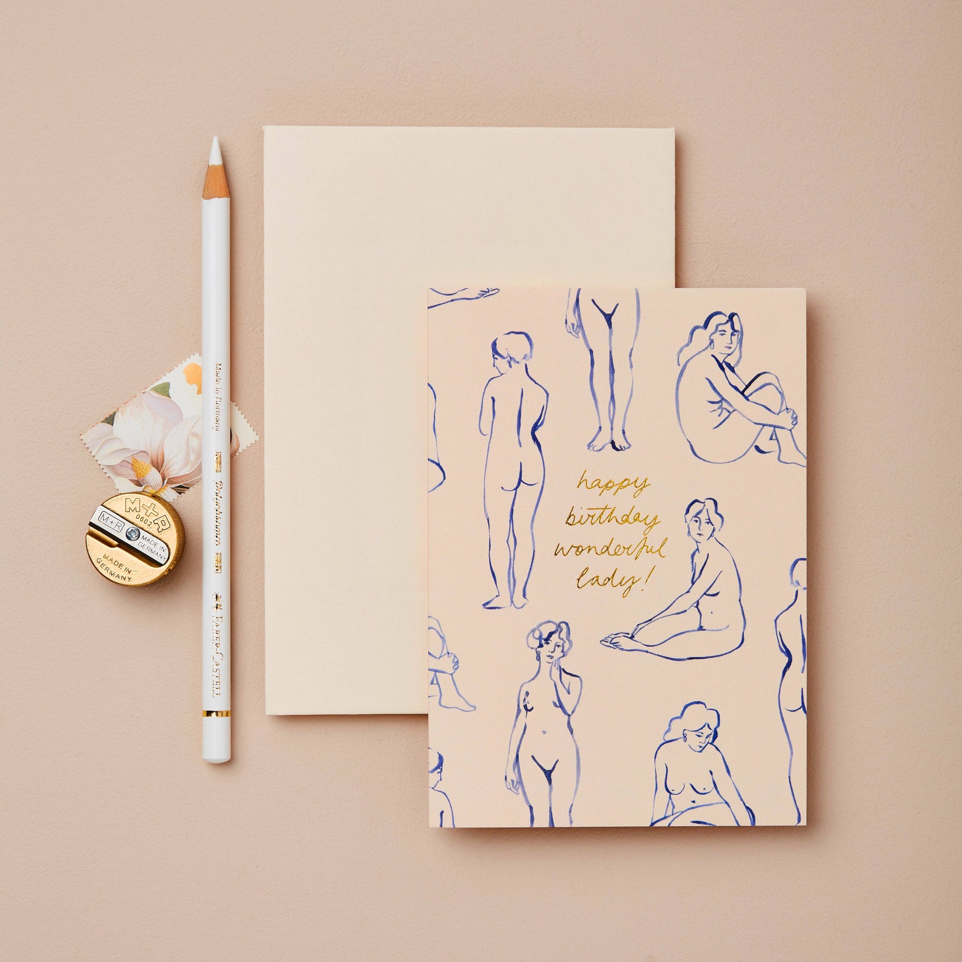 Blush pink card with navy blue line-art nude figures, reading Happy Birthday Wonderful Lady!