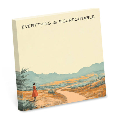 Cream sticky note pad with a vintage travel-poster illustration of a woman walking a desert path, reading Everything is figureoutable