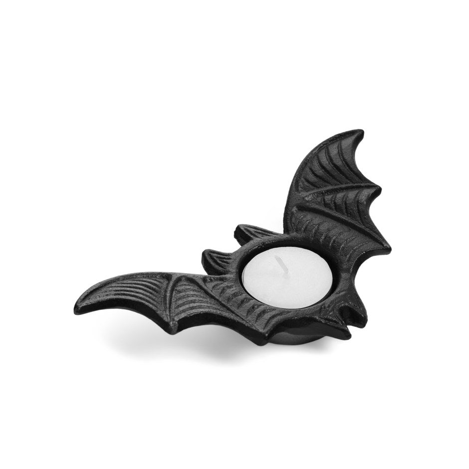 Matte black cast iron bat-shaped tealight candle holder with a tealight in place - PABOOM