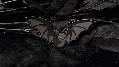 Bat Sticker shown next to a coin for size reference