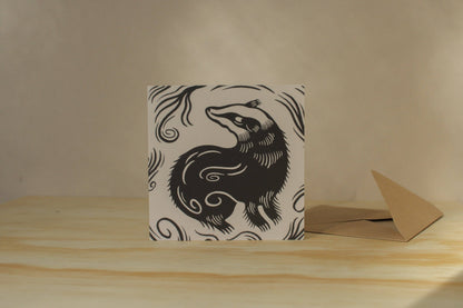 'The Badger' card shown with its kraft envelope on a light background