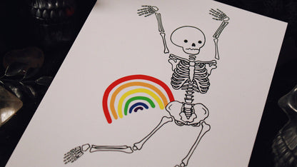 Close-up of the Gay Mess print's hand-drawn dancing skeleton illustration
