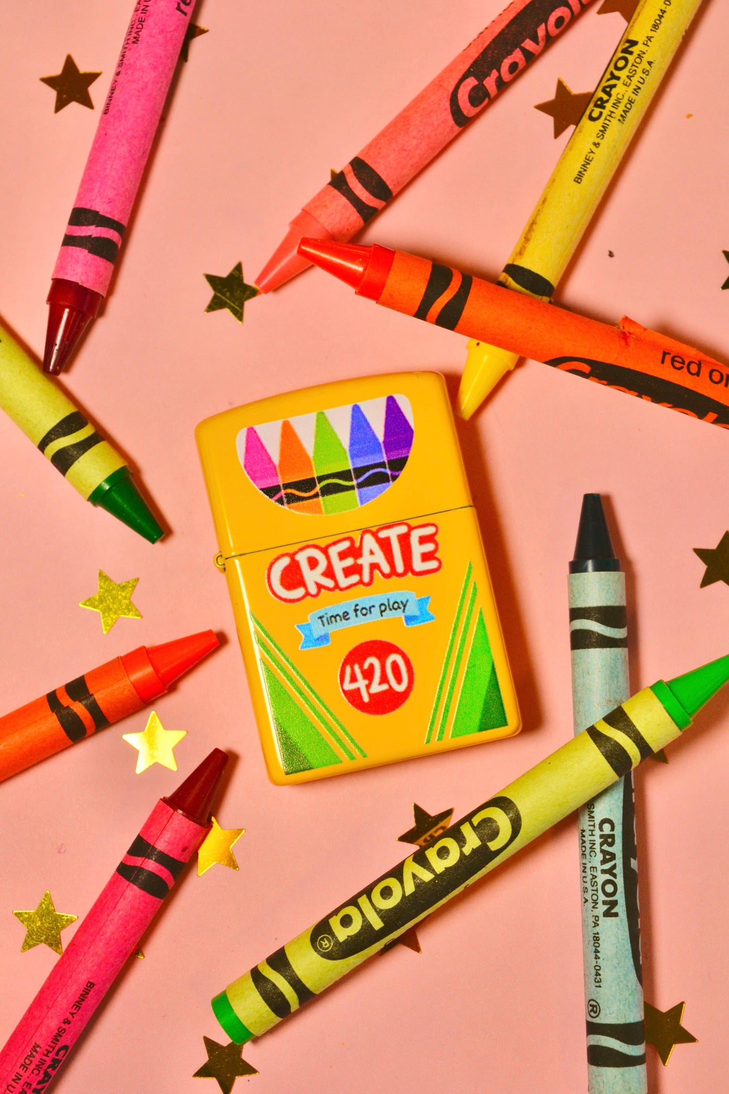 Yellow metal lighter styled like a Crayola crayon box, reading Create, Time for play, 420