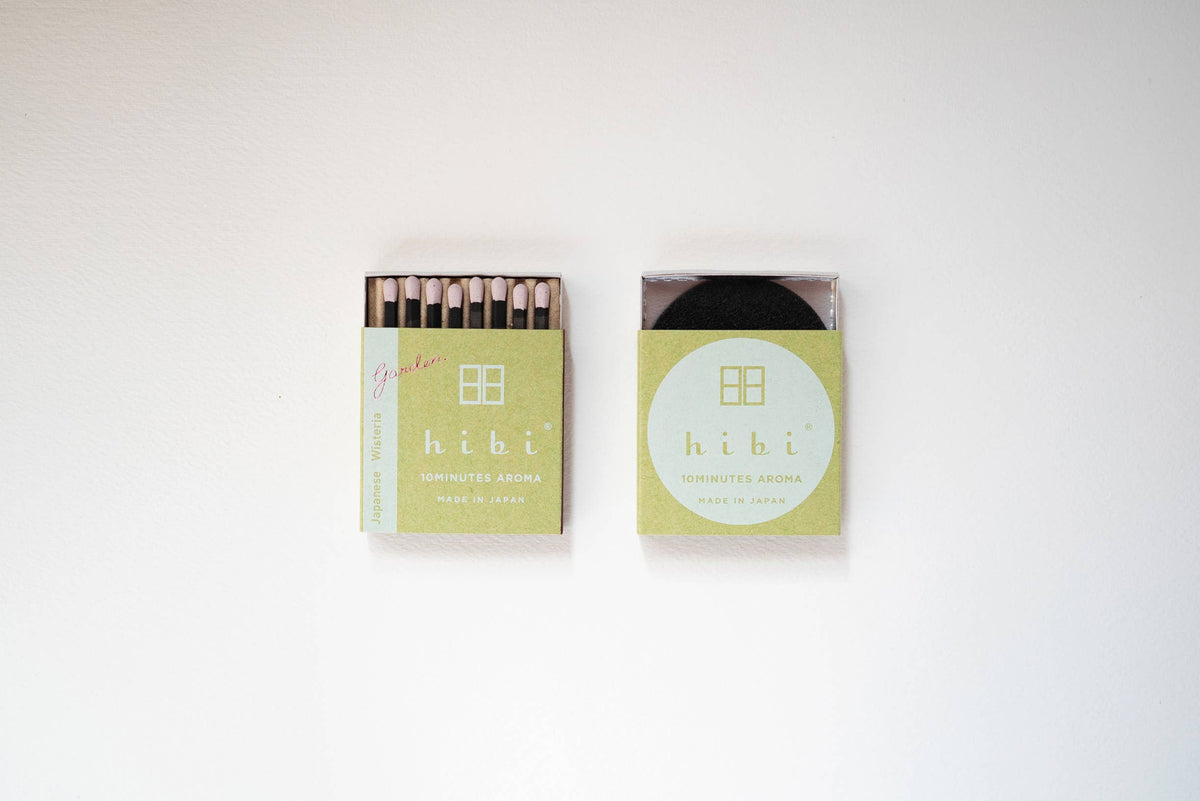 Hibi Japanese Wisteria incense matches in a pale green box, open to show matchsticks beside a closed box - PABOOM