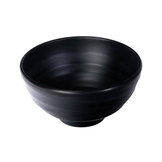 Matte black ribbed melamine bowl viewed from a front angle