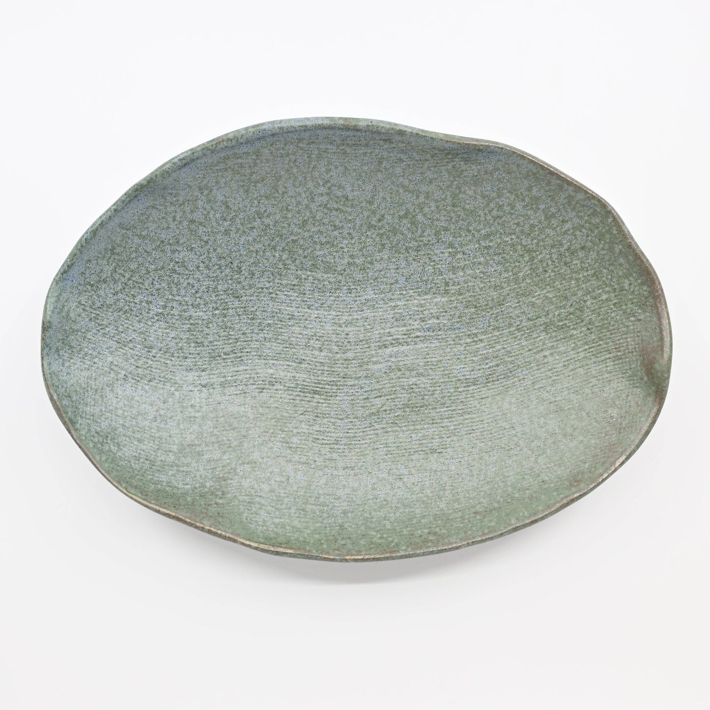 Nature Green tripod plate shown from a top-down angle