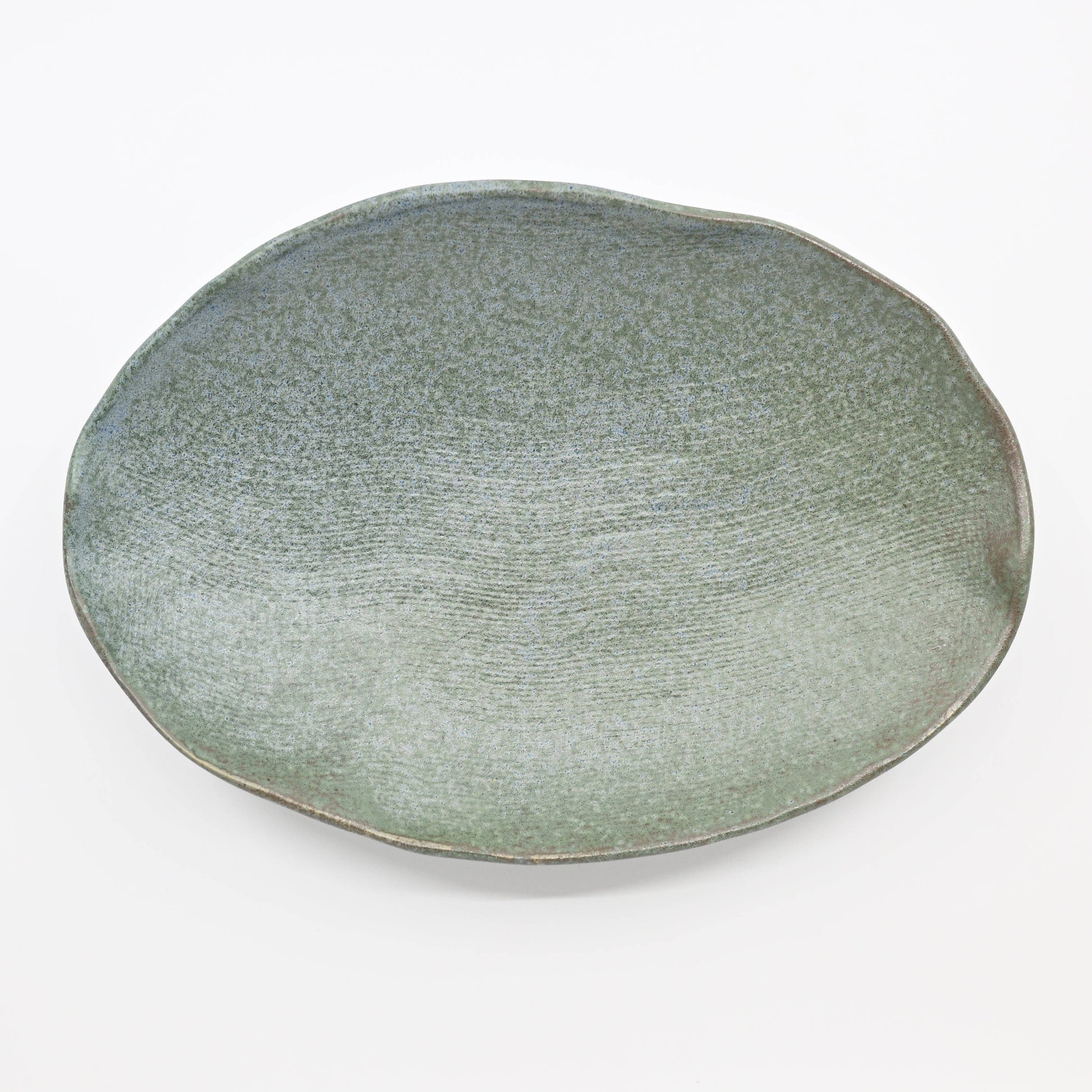 Nature Green tripod plate shown from a top-down angle