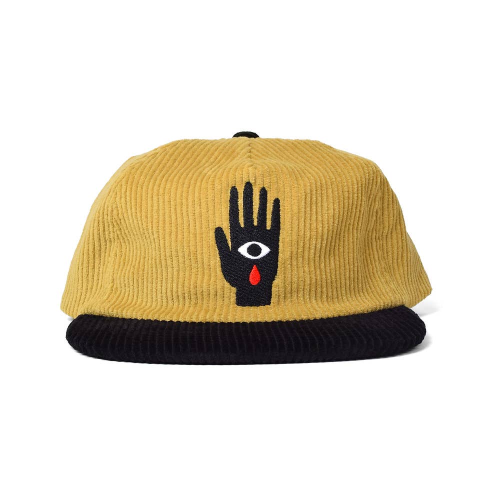 Black and mustard gold corduroy dad hat with an embroidered black hand patch featuring a white eye and red teardrop - PABOOM