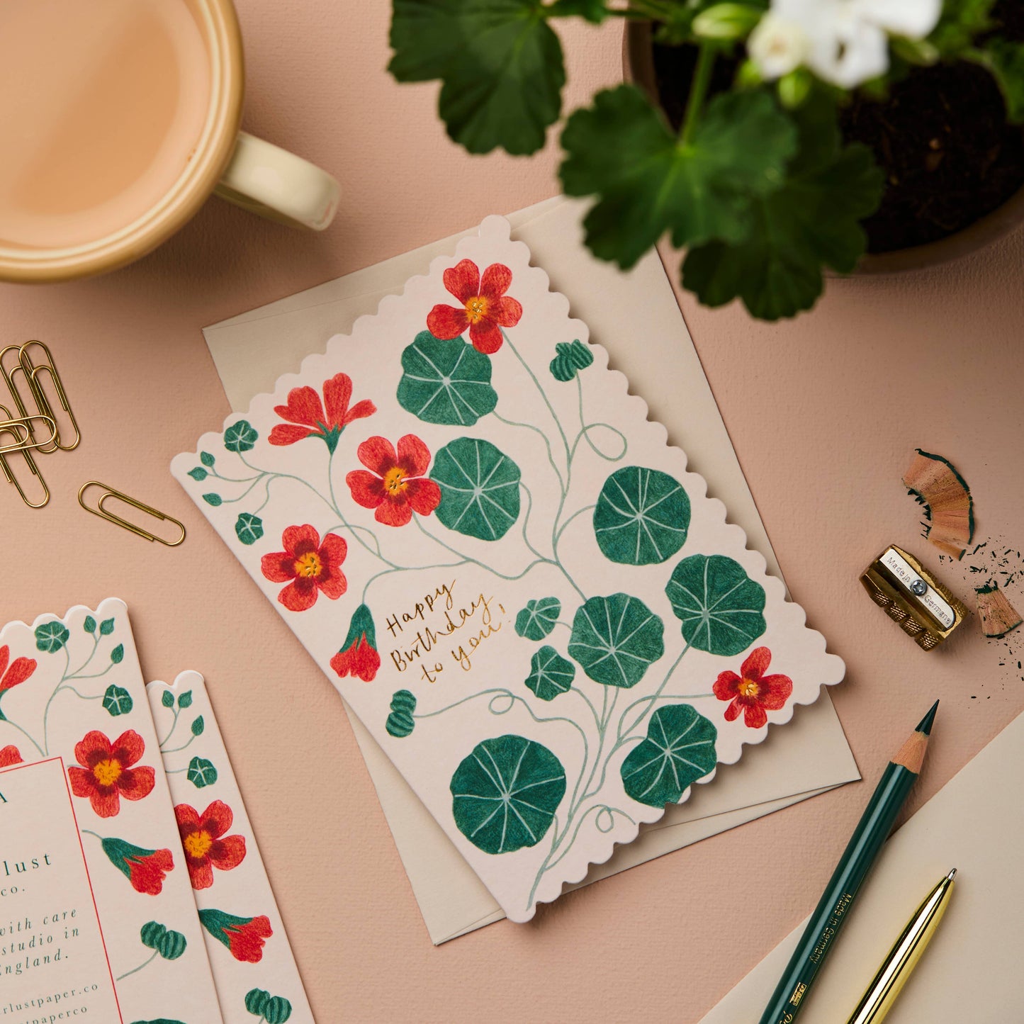 Red and orange nasturtium flowers on cream scalloped card, reading Happy Birthday to You!