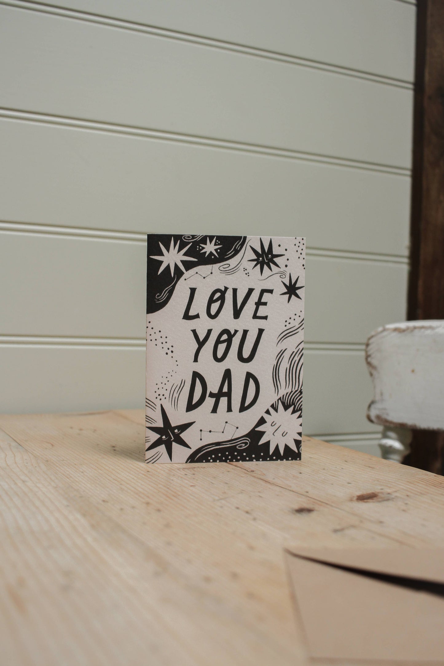 'Love You Dad' Father's Day card shown at an angle with envelope