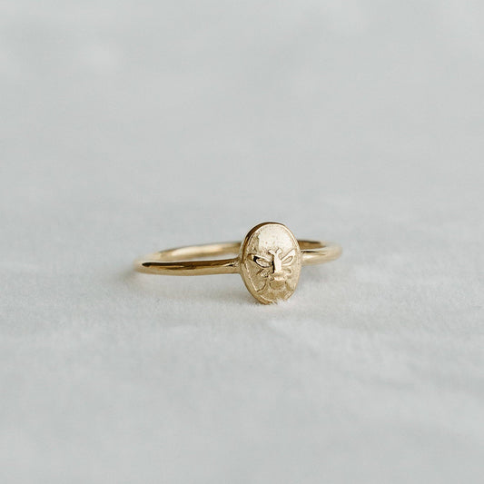 Bee Signet Ring with an embossed bee motif on an oval gold face - PABOOM