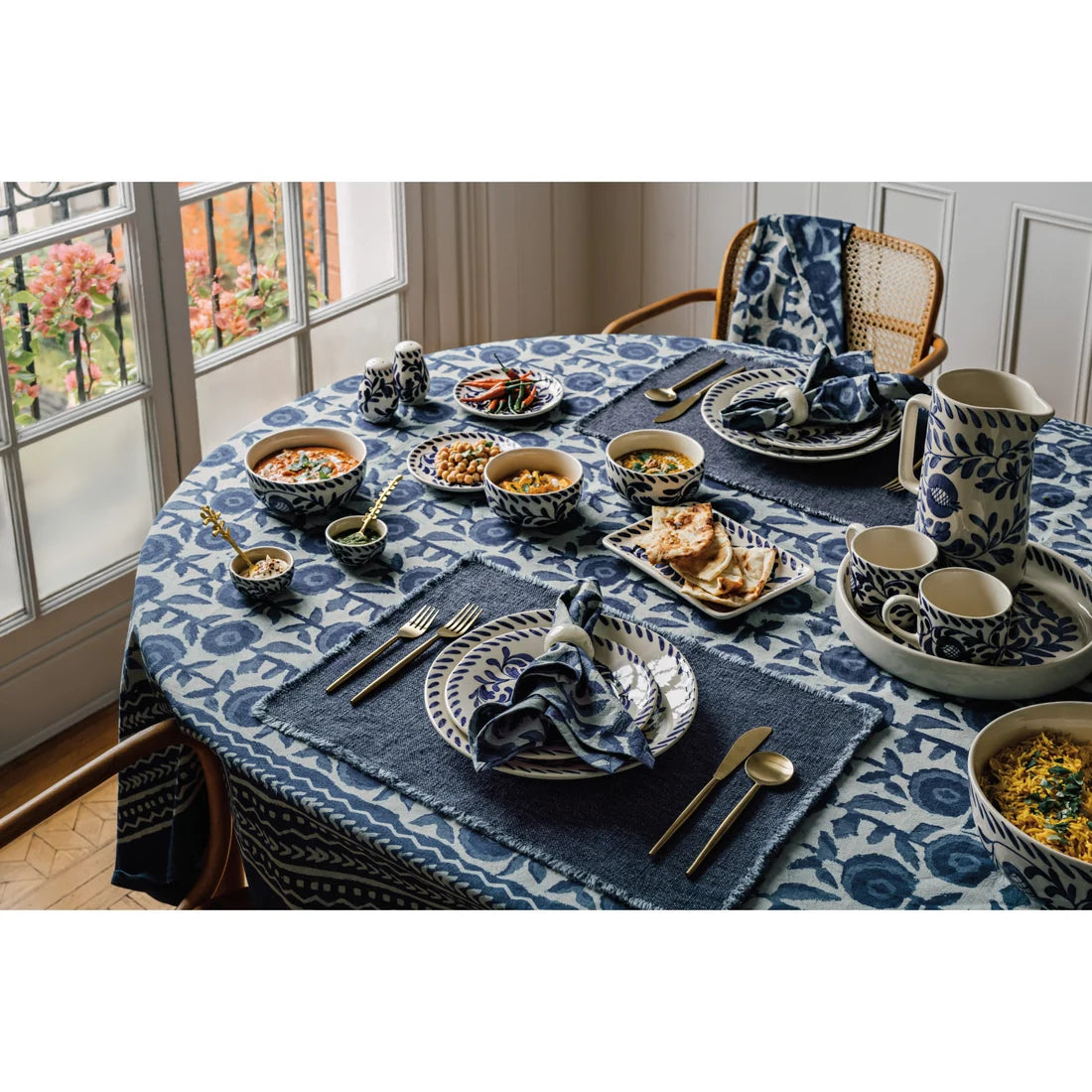 Single Gilia napkin unfolded, displaying the full navy block print floral pattern - PABOOM