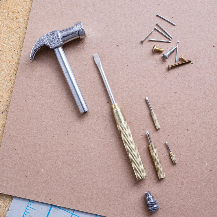 Handy hammer shown with handle screwed together.