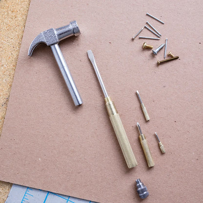 Handy hammer shown with handle screwed together.